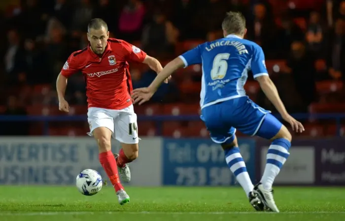 Framed Print : Joe Cole vs Olly Lancashire: A Battle for Supremacy in Coventry City's Sky Bet League One Clash at Rochdale's Spotland Stadium Framed Print : Joe Cole vs Olly Lancashire: A Battle for Supremacy in Coventry City's Sky Bet League One Clash at Rochdale's Spotland Stadium