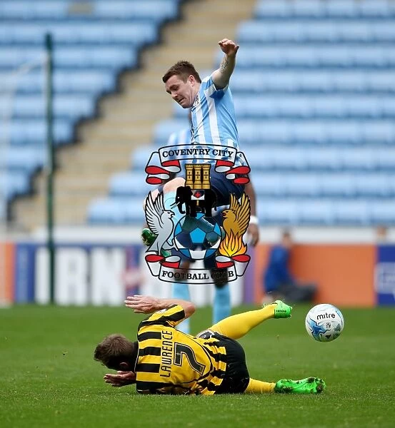 John Fleck Defies Gravity: Soaring Over Liam Lawrence's Tackle in Coventry City's Victory