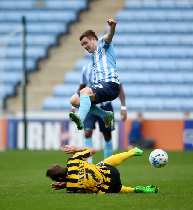 Framed Print : John Fleck Defies Gravity: Soaring Over Liam Lawrence's Tackle in Coventry City's Victory Framed Print : John Fleck Defies Gravity: Soaring Over Liam Lawrence's Tackle in Coventry City's Victory