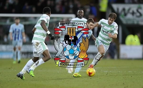 John Fleck Evades Pressure from Nathan Smith and Sam Foley in Coventry City's Sky Bet League One Clash at Huish Park