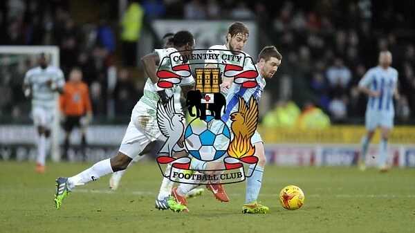 John Fleck Evasive: Escaping Pressure from Smith and Foley in Coventry City's Sky Bet League One Clash