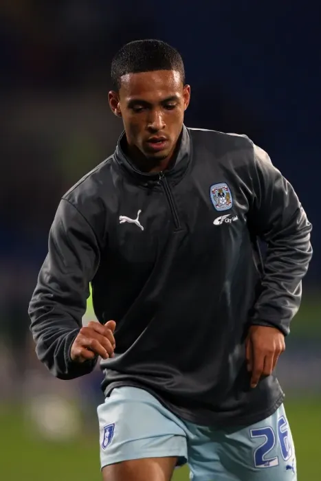 Framed Print : Jordan Clarke vs. Cardiff City: A Fierce Face-Off at Npower Championship (21-03-2012)
