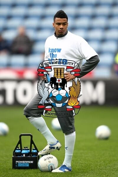 Jordan Willis Pre-Match Warm-Up: Know the Score T-shirt at Ricoh Arena (Coventry City vs. Peterborough United, Npower Football League Championship, 07-04-2012)