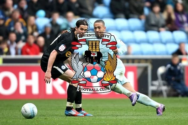 Jordon Clarke Outsmarts George Boyd: Coventry City vs. Peterborough United in Npower Championship Action at Ricoh Arena