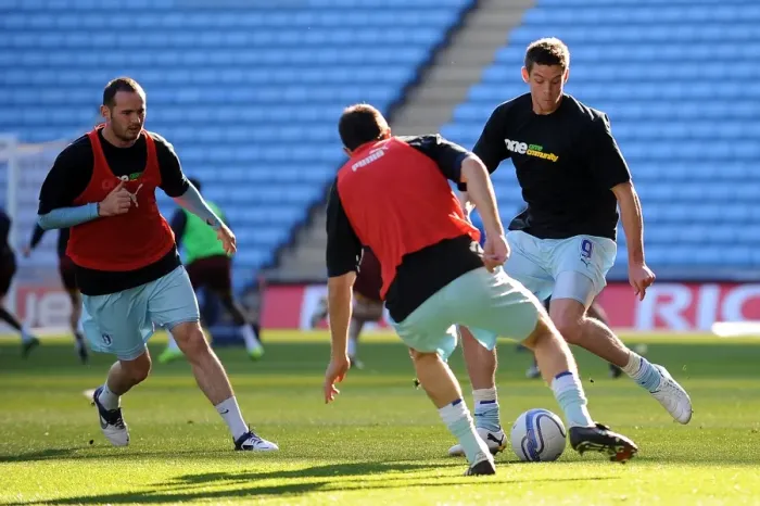 Framed Print : Lucas Jutkiewicz Gearing Up: Coventry City's Star Forward in Focus during Warm-Up vs Burnley (October 2011)