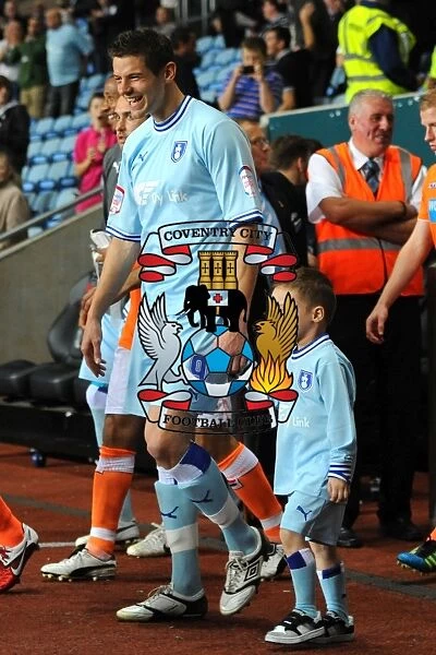 Lukas Jutkiewicz and Coventry City Mascot Leading the Team Out at Ricoh Arena vs Blackpool (Npower Championship, 2011)