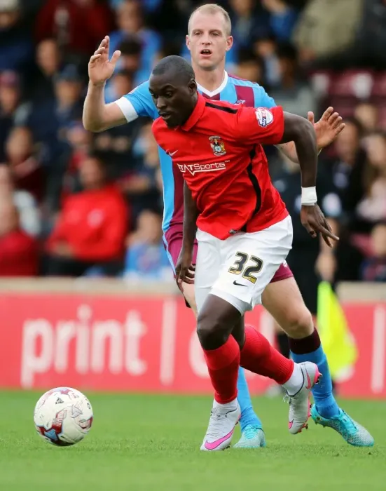 Framed Print : Marc-Antoine Fortune vs Neal Bishop: Coventry City's Gritty Battle in Sky Bet League One Framed Print : Marc-Antoine Fortune vs Neal Bishop: Coventry City's Gritty Battle in Sky Bet League One