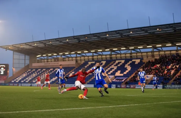 Framed Print : Marc Antoine-Fortune's Determined Shot: Coventry City vs Colchester United in Sky Bet League One