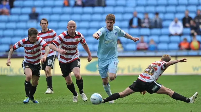 Framed Print : Martin Cranie's Determined Attack: Coventry City vs Doncaster Rovers (Npower Championship, 21-04-2012, Ricoh Arena) Framed Print : Martin Cranie's Determined Attack: Coventry City vs Doncaster Rovers (Npower Championship, 21-04-2012, Ricoh Arena)