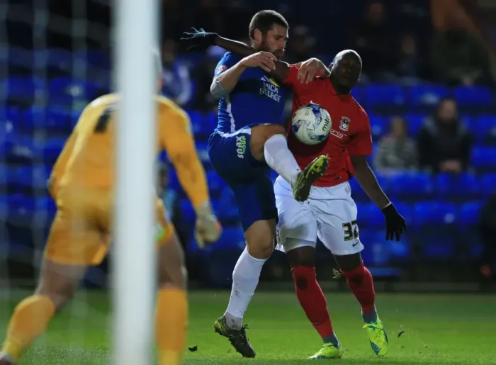 Framed Print : Michael Bostwick vs Marc Antoine Fortune: Intense Battle for Ball Possession in Peterborough United vs Coventry City, Sky Bet League One Framed Print : Michael Bostwick vs Marc Antoine Fortune: Intense Battle for Ball Possession in Peterborough United vs Coventry City, Sky Bet League One