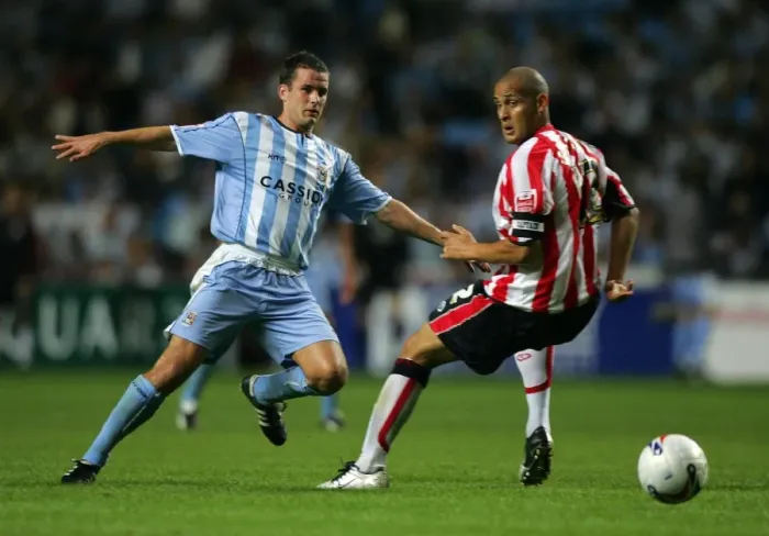 Framed Print : Michael Doyle of Coventry City Outwits Nigel Quashie with a Clever Pass (2005) Framed Print : Michael Doyle of Coventry City Outwits Nigel Quashie with a Clever Pass (2005)