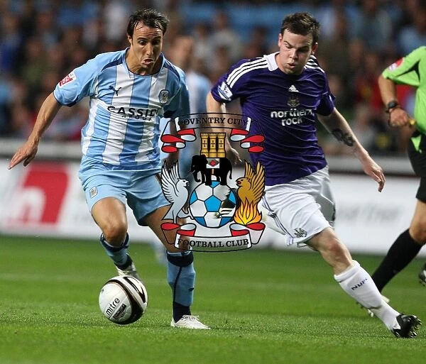 Micheal Misfud vs Danny Guthrie: Tussle in the Carling Cup Second Round between Coventry City and Newcastle United (26-08-2008)