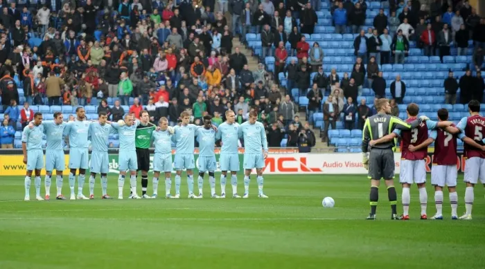 Framed Print : A Moment of Silence: Honoring Coventry's Resilient Past - Coventry City vs. West Ham United (November 19, 2011)