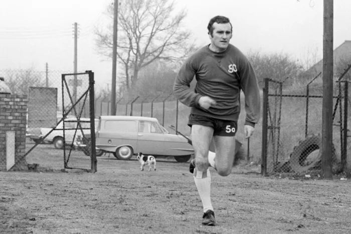 Framed Print : Noel Cantwell Sprints Ahead: Coventry City Manager's Intense Training Session with Surprising Canine Spectator (Former Managers) Framed Print : Noel Cantwell Sprints Ahead: Coventry City Manager's Intense Training Session with Surprising Canine Spectator (Former Managers)