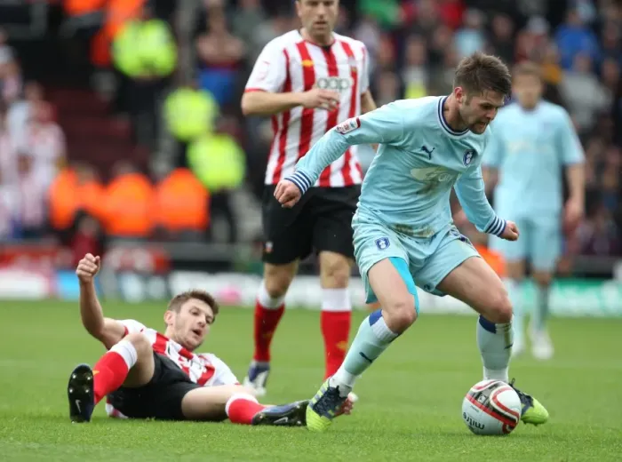 Framed Print : Norwood Evasive: Coventry City's Oliver Norwood Slips Past Southampton's Adam Lallana