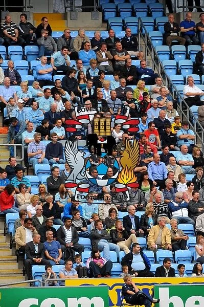 Npower Championship Showdown: Coventry City vs Reading - Intense Focus of Coventry Fans at Ricoh Arena (September 24, 2011)