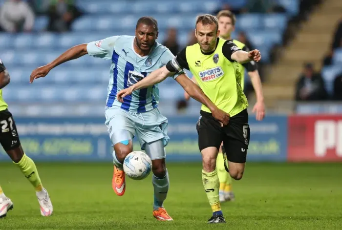 Framed Print : Reda Johnson vs. Liam Kelly: A Fierce Rivalry Unfolds in Coventry City's Sky Bet League One Clash against Oldham Athletic Framed Print : Reda Johnson vs. Liam Kelly: A Fierce Rivalry Unfolds in Coventry City's Sky Bet League One Clash against Oldham Athletic