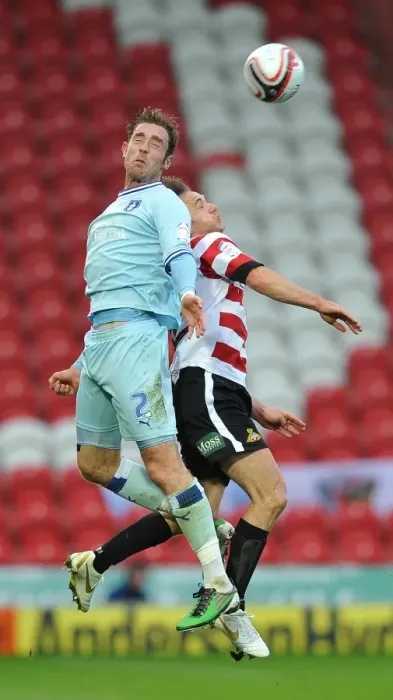 Framed Print : Richard Keogh Soars Over James Hayter in Coventry City vs Doncaster Rovers Npower Championship Clash Framed Print : Richard Keogh Soars Over James Hayter in Coventry City vs Doncaster Rovers Npower Championship Clash