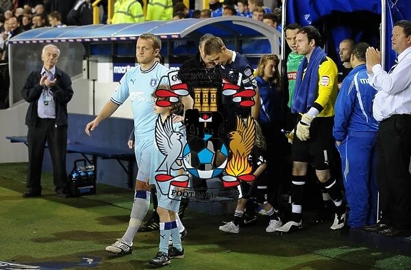 Sammy Clingan Leads Coventry City Out at The Den for Npower Championship Match against Millwall (November 1, 2011)