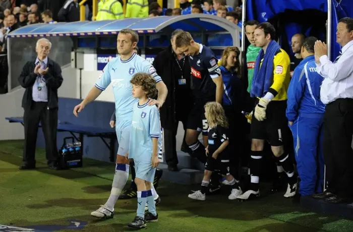 Framed Print : Sammy Clingan Leads Coventry City Out at The Den for Npower Championship Match against Millwall (November 1, 2011) Framed Print : Sammy Clingan Leads Coventry City Out at The Den for Npower Championship Match against Millwall (November 1, 2011)