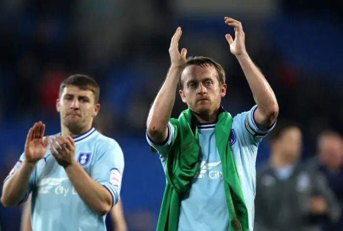 Framed Print : Sammy Clingan's Heartfelt Applause: Coventry City Captain Honors Fans After Npower Championship Match vs. Cardiff City (21-03-2012)