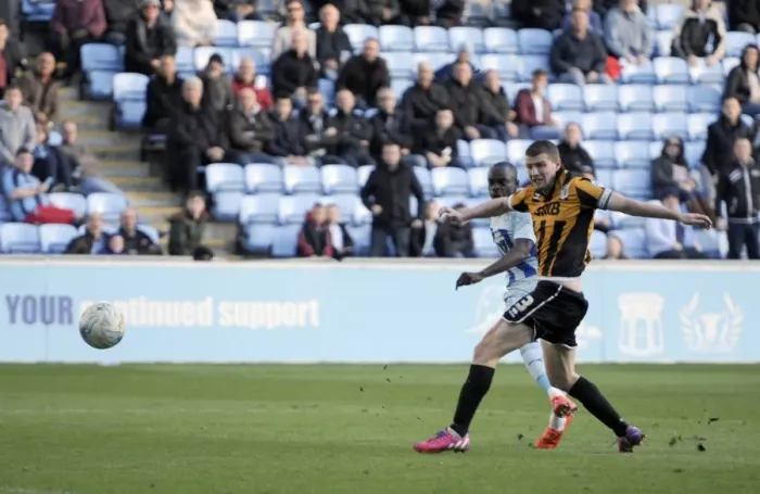 Framed Print : Sanmi Odelusi's Pressured Strike: Coventry City's Second Goal vs Port Vale (Sky Bet League One)