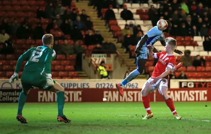 Framed Print : Sanmi Odelusi's Thrilling Header: Coventry City vs Barnsley in Sky Bet League One Framed Print : Sanmi Odelusi's Thrilling Header: Coventry City vs Barnsley in Sky Bet League One