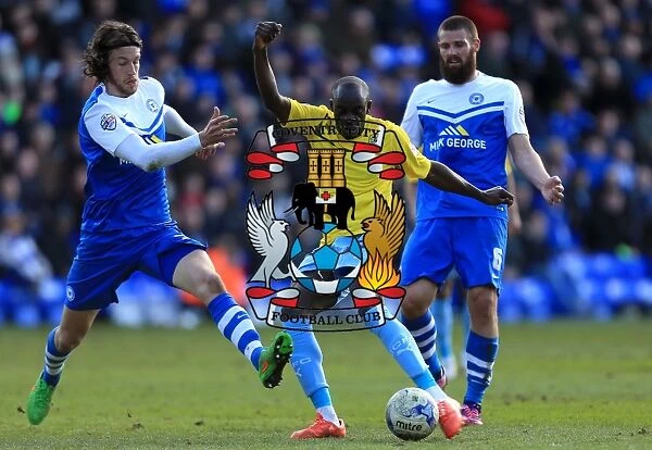 Sanmi Odelusi's Tight Squeeze: Coventry City vs. Peterborough United in Sky Bet League One - Coventry Forward Scores Under Pressure