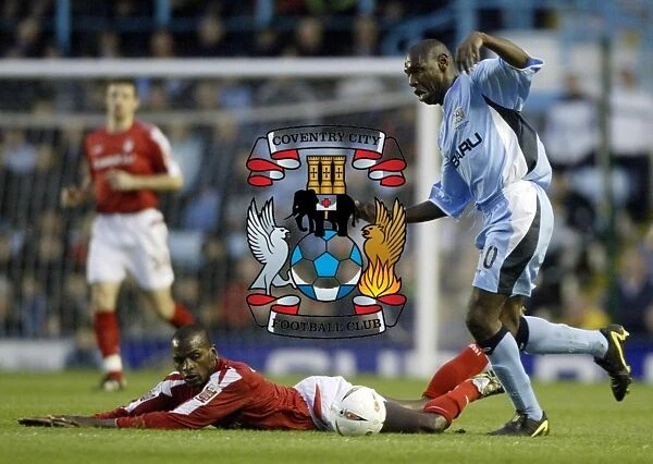 Shaun Goater's Tackle: Coventry City vs. Nottingham Forest in Championship Action (06-04-2005)