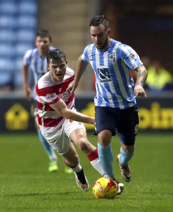 Framed Print : Sky Bet League One Showdown at RICOH Arena: Coventry City vs Doncaster Rovers - A Clash Between Adam Armstrong and Harry Middleton