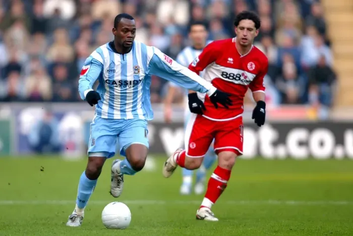 Framed Print : Stern John Surges Past Fabio Rochemback: Coventry City vs. Middlesbrough in FA Cup Fourth Round, Ricoh Arena (2006) Framed Print : Stern John Surges Past Fabio Rochemback: Coventry City vs. Middlesbrough in FA Cup Fourth Round, Ricoh Arena (2006)