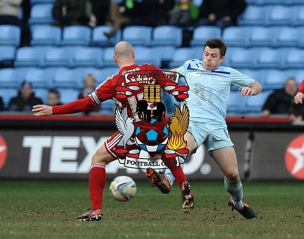 Steven Jennings vs Alan McCormack: Intense Tackle in Coventry City vs Swindon Town Npower League One Match