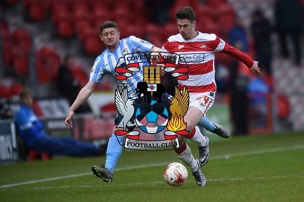 Tommy Rowe vs. Aaron Phillips: Intense Battle in Coventry City's Sky Bet League One Clash at Doncaster Rovers