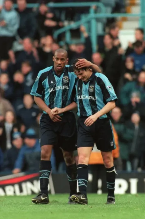 Framed Print : Unforgettable Moment: Dion Dublin and Noel Whelan's Epic Goal Celebration vs. Arsenal (FA Carling Premiership) Framed Print : Unforgettable Moment: Dion Dublin and Noel Whelan's Epic Goal Celebration vs. Arsenal (FA Carling Premiership)