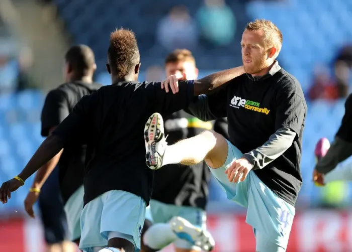 Framed Print : Warming Up: Gael Bigirimana and Sammy Clingan Prepare for Coventry City's Npower Championship Showdown Against Burnley (October 22, 2011, Ricoh Arena) Framed Print : Warming Up: Gael Bigirimana and Sammy Clingan Prepare for Coventry City's Npower Championship Showdown Against Burnley (October 22, 2011, Ricoh Arena)