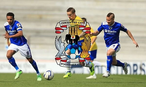 Wesolowski vs. Baker: A Rivalry Ignited in Oldham Athletic vs. Coventry City League One Clash (April 2014)
