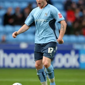 Action-Packed Moment: Aron Gunnarsson of Coventry City Tackles Reading Opponent at Ricoh Arena (Championship 2009) Action-Packed Moment: Aron Gunnarsson of Coventry City Tackles Reading Opponent at Ricoh Arena (Championship 2009)