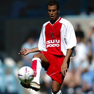 Action-Packed Moment: Yazid Mansouri Faces Off Against Wolverhampton Wanderers (02-08-2003)