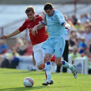 Barnsley vs Coventry City: Intense Battle for the Ball between Scott Wiseman and Lucas Jutkiewicz (Npower Football League Championship, Oakwell Stadium, 01-10-2011) Barnsley vs Coventry City: Intense Battle for the Ball between Scott Wiseman and Lucas Jutkiewicz (Npower Football League Championship, Oakwell Stadium, 01-10-2011)