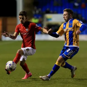 Battle for the Ball: Clarke vs. Lameiras in Intense Sky Bet League One Rivalry Battle for the Ball: Clarke vs. Lameiras in Intense Sky Bet League One Rivalry