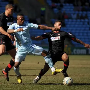 Battle for the Ball: Coventry City vs. Brentford in Football League One at Ricoh Arena Battle for the Ball: Coventry City vs. Brentford in Football League One at Ricoh Arena