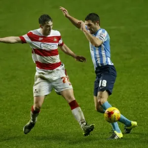 Battle for the Ball: Coventry City vs Doncaster Rovers in Sky Bet League One - Sam Ricketts vs Conor Grant Battle for the Ball: Coventry City vs Doncaster Rovers in Sky Bet League One - Sam Ricketts vs Conor Grant