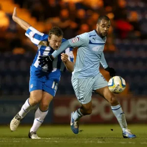 Battle for the Ball: Eastman vs. McGoldrick in Npower League One Clash Battle for the Ball: Eastman vs. McGoldrick in Npower League One Clash