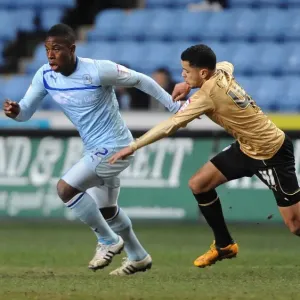 Battle for the Ball: Franck Moussa vs. Billy Clifford - Coventry City vs. Colchester United in Npower League One Battle for the Ball: Franck Moussa vs. Billy Clifford - Coventry City vs. Colchester United in Npower League One