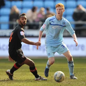 Battle for the Ball: Logan vs Haynes in Coventry City vs Brentford Clash (Npower League One, April 6, 2013) Battle for the Ball: Logan vs Haynes in Coventry City vs Brentford Clash (Npower League One, April 6, 2013)