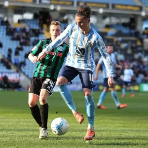 Battle for the Ball: Maddison vs. Allen in Coventry City's Sky Bet League One Clash