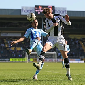 Battle for the Ball: McCourt vs. Ward in Sky Bet League One Clash at Meadow Lane