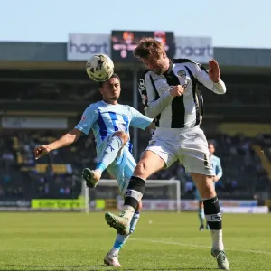 Battle for the Ball: McCourt vs. Ward in Sky Bet League One Clash at Meadow Lane Battle for the Ball: McCourt vs. Ward in Sky Bet League One Clash at Meadow Lane