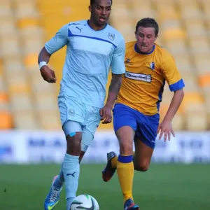 Battle for the Ball: McGuire vs. Christie, Mansfield Town vs. Coventry City Friendly Battle for the Ball: McGuire vs. Christie, Mansfield Town vs. Coventry City Friendly