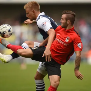 Battle for the Ball: Webster vs. Armstrong in Millwall vs. Coventry City (Sky Bet League One) Battle for the Ball: Webster vs. Armstrong in Millwall vs. Coventry City (Sky Bet League One)